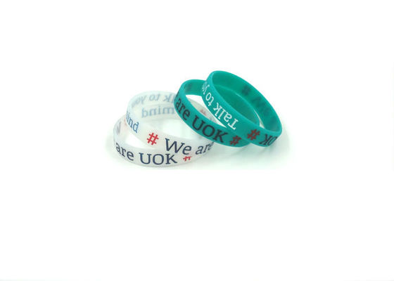 Custom Logo Custom Silicone Bracelets , Silicone Band Bracelets With Colorful Words Infilled supplier